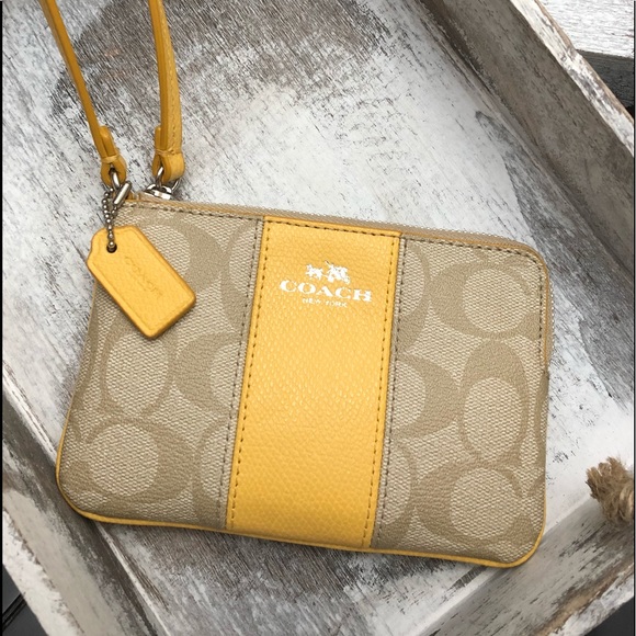 Coach Handbags - Coach Yellow Wristlet